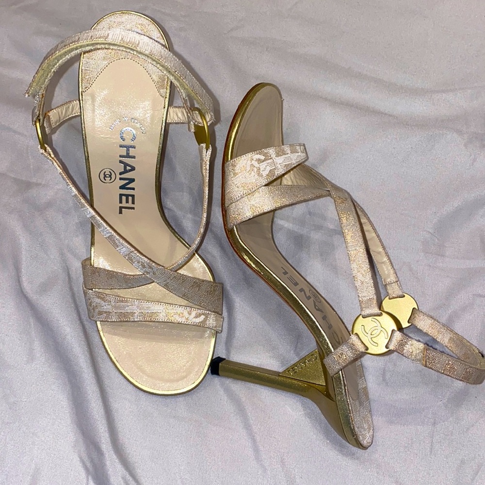 Chanel gold and white shoes size 7. 4” heels. Logo With adjustable strap in back